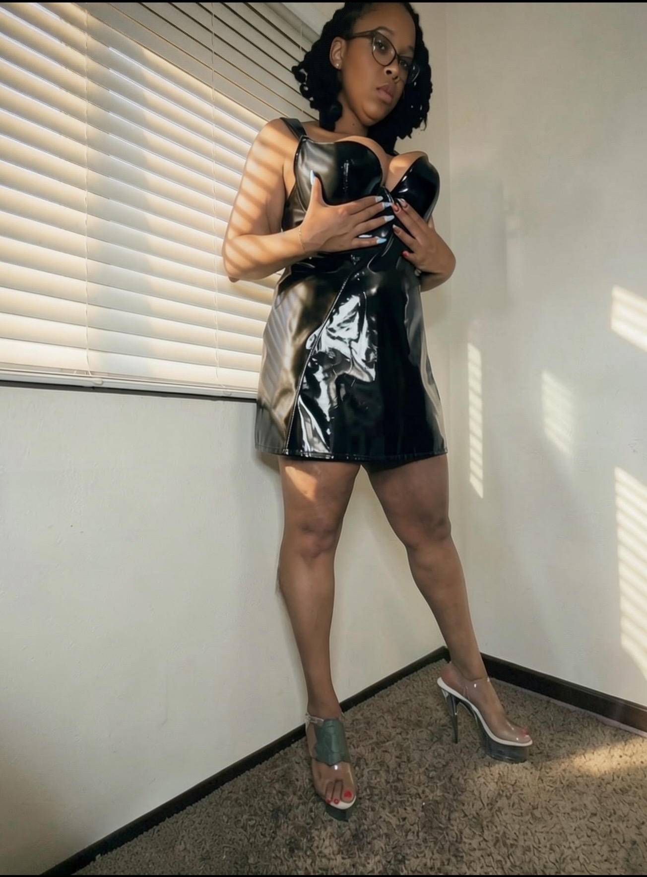 Mistress Janelle in black latex, Bay Area professional dominatrix
